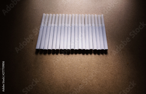Cigarettes on Brown Surface