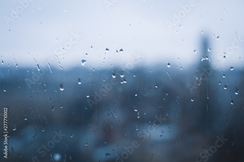 raindrops on the window in blue