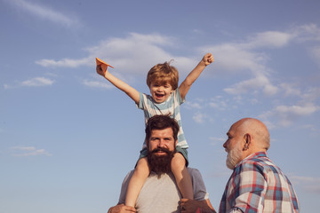 Happy fathers day. Father son and grandfather relaxing together. Family generation: future dream and people concept.
