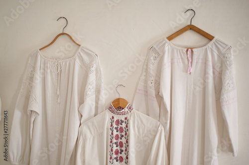 Old white linen shirt. The national dress of the Cossacks. Simple fabrics , ethnics. © gal2007