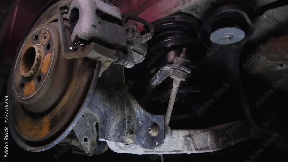 The structure of the car, car parts under the hood, car view from below, repair, garage, car disassembly into parts Paintless Dent Repair Removal. PDR. The structure of the car, car parts under the hood, car view from below, repair, garage, car disassembly into parts Paintless Dent Repair Removal. PDR.