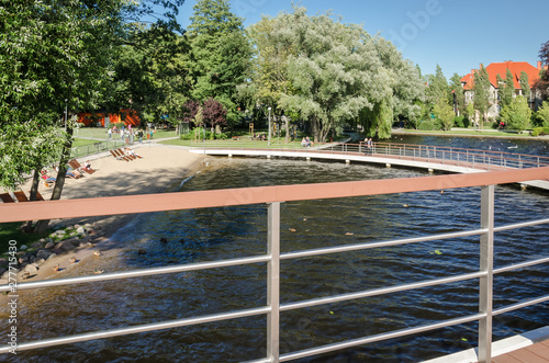 HOLIDAYS BY THE LAKE - Sunny hot day on the promenade photo