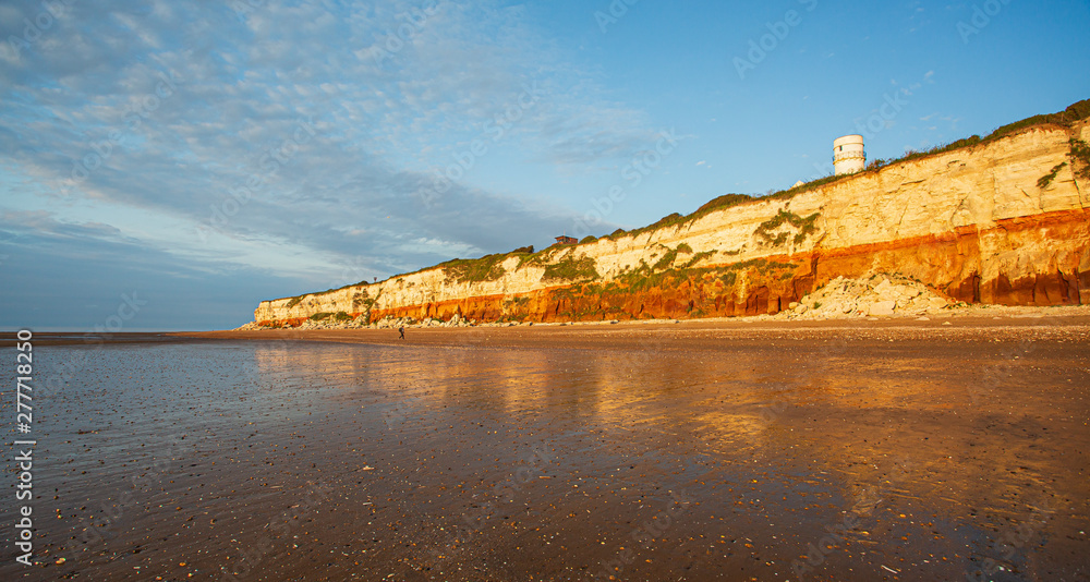 The famous red and white chalk cliffs of Hunstanton in Norfolk, England.