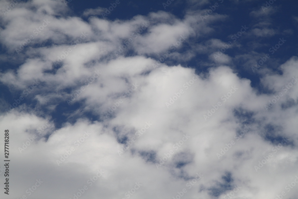 The vast blue sky and clouds sky. blue sky background with tiny clouds. 