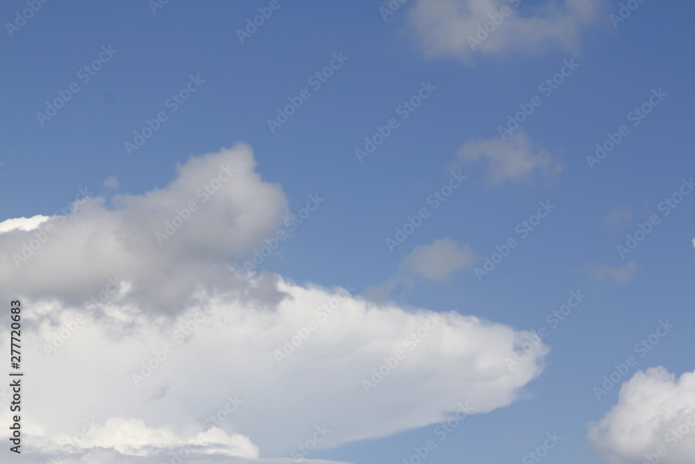 The vast blue sky and clouds sky. blue sky background with tiny clouds. The vast blue sky and clouds sky. blue sky background with tiny clouds.