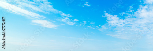 Blue sky with small clouds in summertime