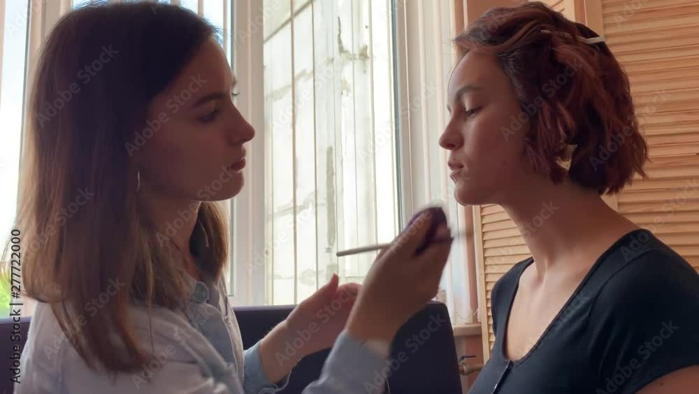 Hairdresser makes styling and makeup for pretty woman model.Before and after