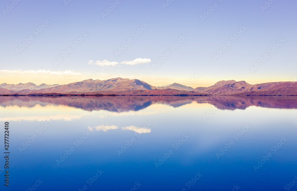 Mountain reflection in blue lake