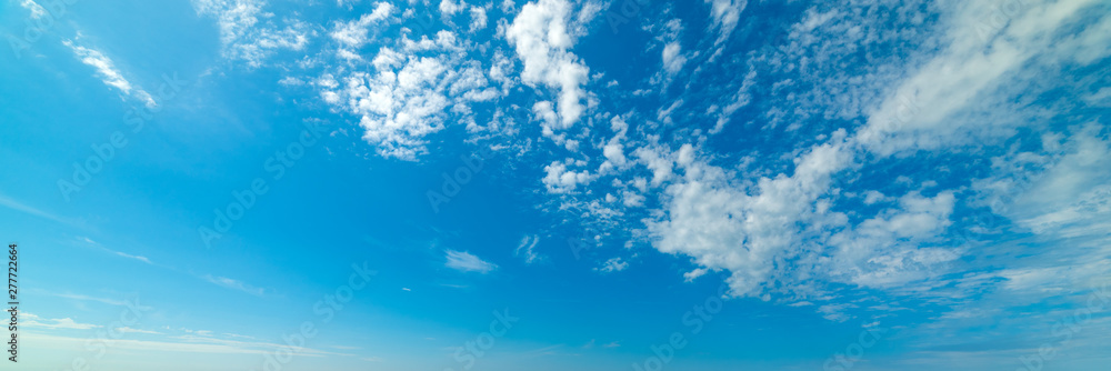 Small clouds and blue sky in the summertime Small clouds and blue sky in the summertime