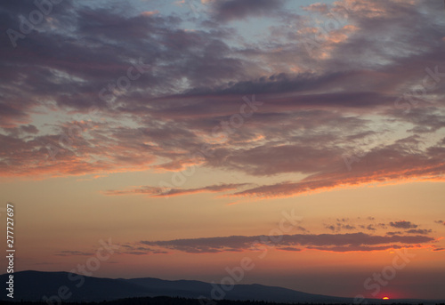 Dramatic sunny hills under morning sky. Carpathian, Ukraine, 