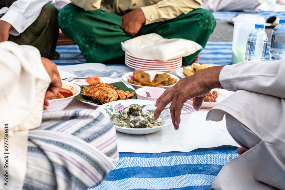 Ramadan iftar buffet with Thai food menu. Food set including palm date, sweet and drink. Peopel waiting time for fast breaking. Ramadan iftar buffet with Thai food menu. Food set including palm date, sweet and drink. Peopel waiting time for fast breaking.