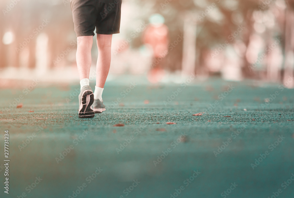 run jogging exercise for health lose weight concept on track rubber public park. Vintage tone