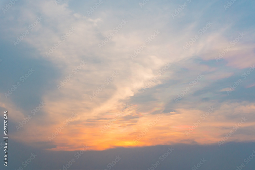 Dramatic blue sky with white cloud after sunset in fantastic evening day,dark sky,colorful nature pattern background,light reflection sunlignt from the sun