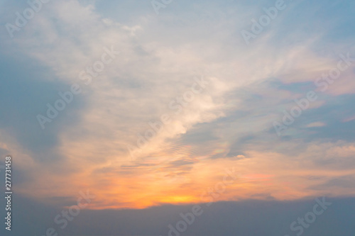 Dramatic blue sky with white cloud after sunset in fantastic evening day,dark sky,colorful nature pattern background,light reflection sunlignt from the sun © sirinyapak