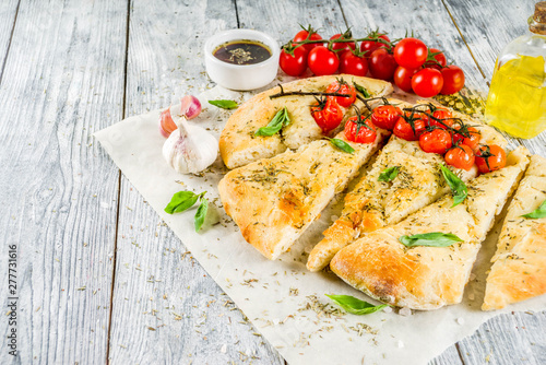 Focaccia with tomatoes and basil