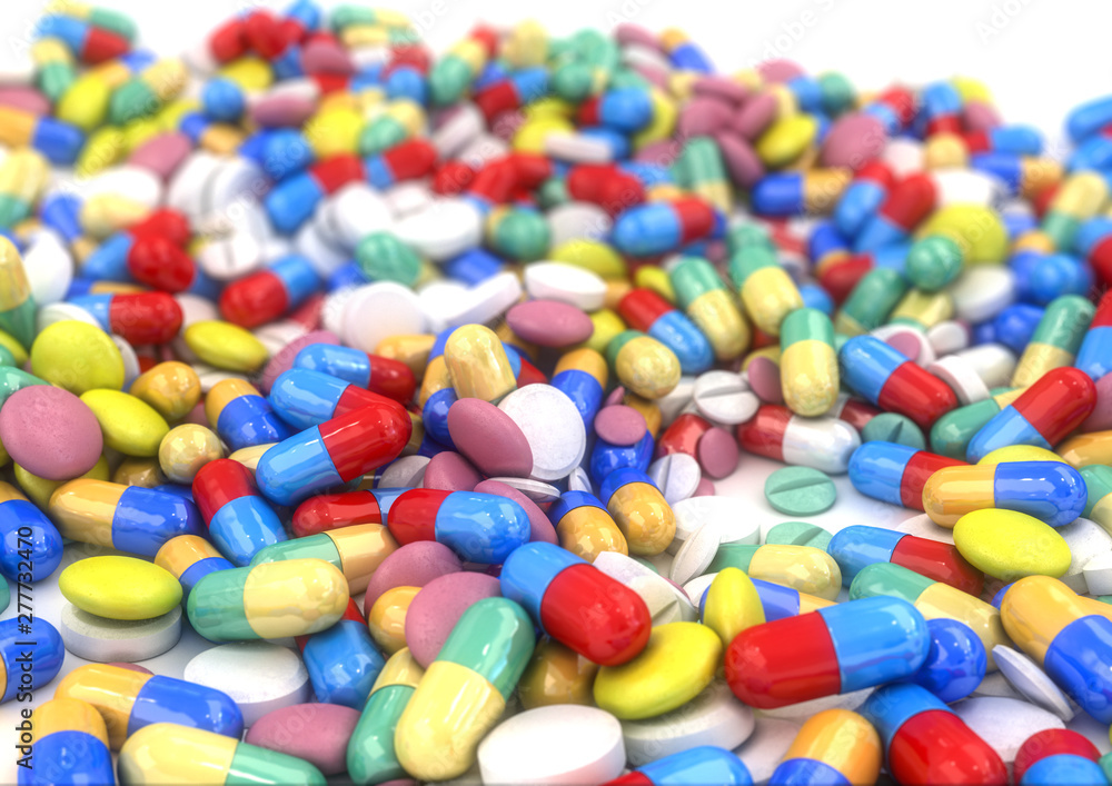 Different pills and capsules placed on a table, with low depth of field Different pills and capsules placed on a table, with low depth of field