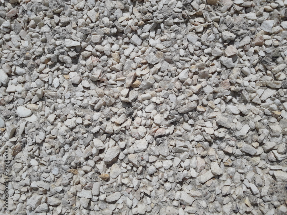 White rock texture. Stone background. White abstract stone background. Concrete wall facing marble stone. White rock texture. Stone background. White abstract stone background. Concrete wall facing marble stone.