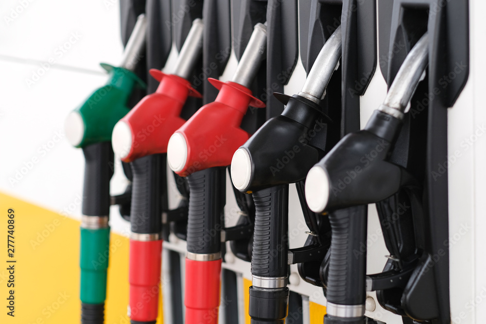 Gas station. Gas station in the mountains. Guns for refueling at a gas station on a sunset day in the summer in the mountains Gas station. Gas station in the mountains. Guns for refueling at a gas station on a sunset day in the summer in the mountains