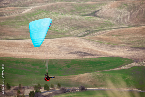 Darrell Anglen paraglides at Steptoe Butte State Park in eastern Washington.      photo