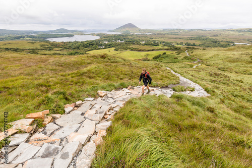 Upper Diamond Hill Walk. Connemara National Park, Letterfrack, Galway, Ireland: Hiking in the mountains and through the clouds with magic views over the National Park. photo