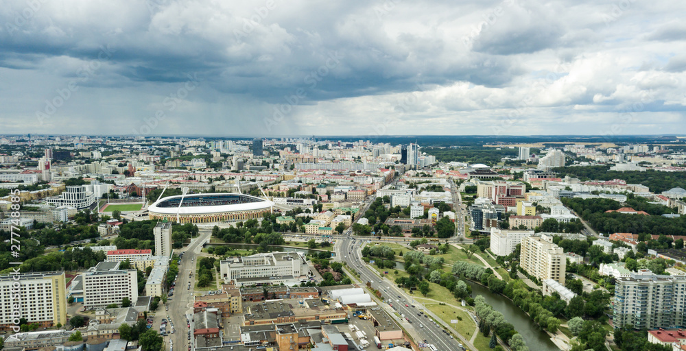 The view of the city of Minsk. Belarus. The storm clouds, the stadium and the city. Photos from the drone.