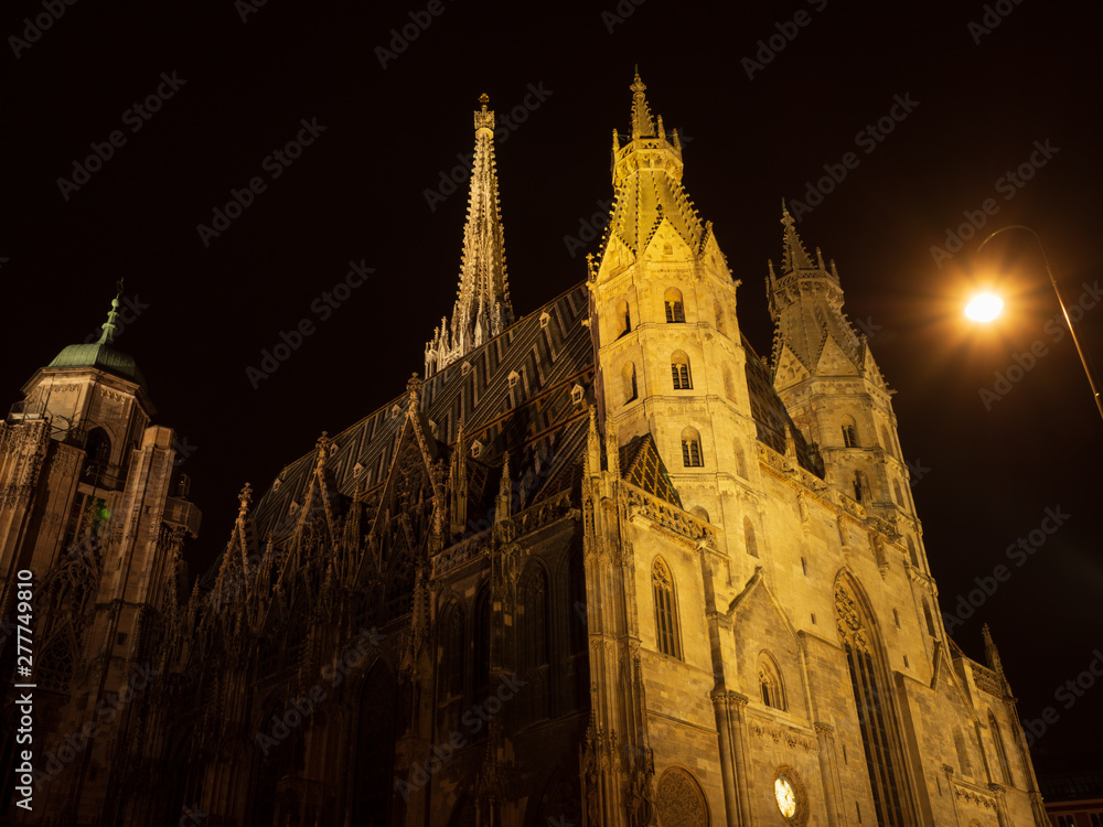 A view of St. Stephen's Cathedral at night in Vienna, Austria.