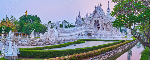 Panorama of White Temple and its topiary garden, Chiang Rai, Thailand photo