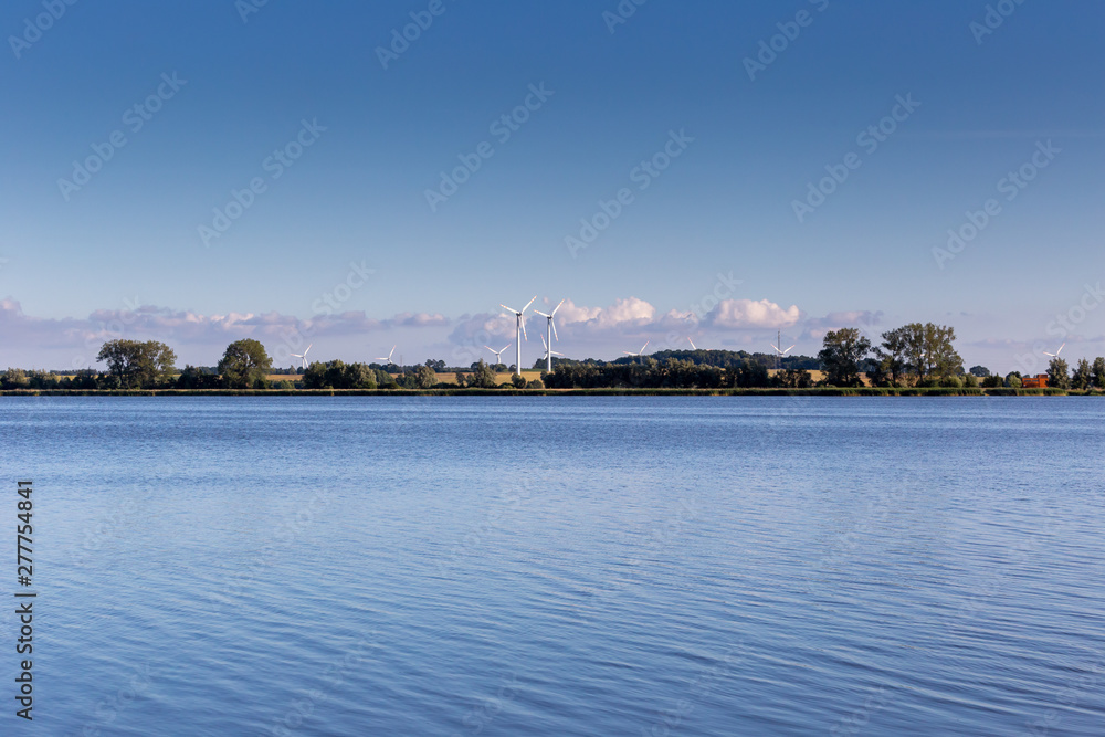 Wind turbines near a lake in Poland