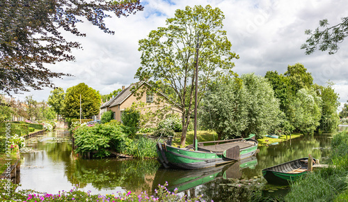 Panorama picture of the boats in a canal in the picturesque village of Drimmelen, Netherlands