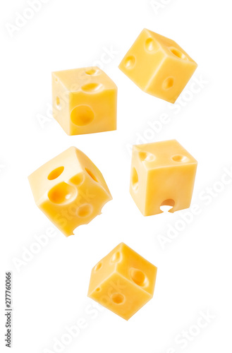 Set of fly cheese cubes isolated on white background.