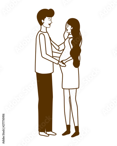 silhouette of pregnant woman with husband standing