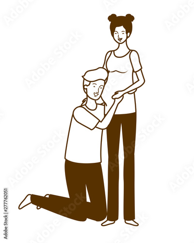 silhouette of pregnant woman with husband standing