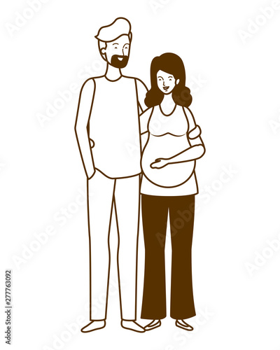 silhouette of pregnant woman with husband standing
