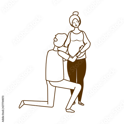 silhouette of pregnant woman with husband standing