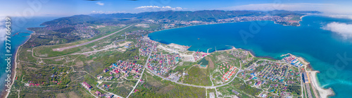 Panorama of the resort city of Gelendzhik. The kind with the Thin Cape. Gelendzhik Bay is visible in the background of Markotkh ridge. On the right the entrance to the Gelendzhik Bay and the lighthous photo