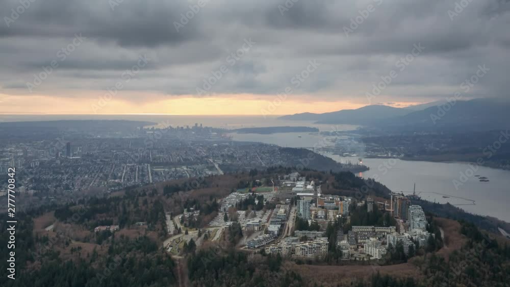 Striking Aerial view of Burnaby Mountain during a dramatic cloudy sunset. Taken in Vancouver, British Columbia, Canada. Still Image Continuous Animation Striking Aerial view of Burnaby Mountain during a dramatic cloudy sunset. Taken in Vancouver, British Columbia, Canada. Still Image Continuous Animation
