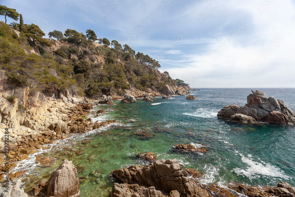 Mediterranean coast and cliffs in Lloret de Mar, Costa Brava, Catalonia, Spain.