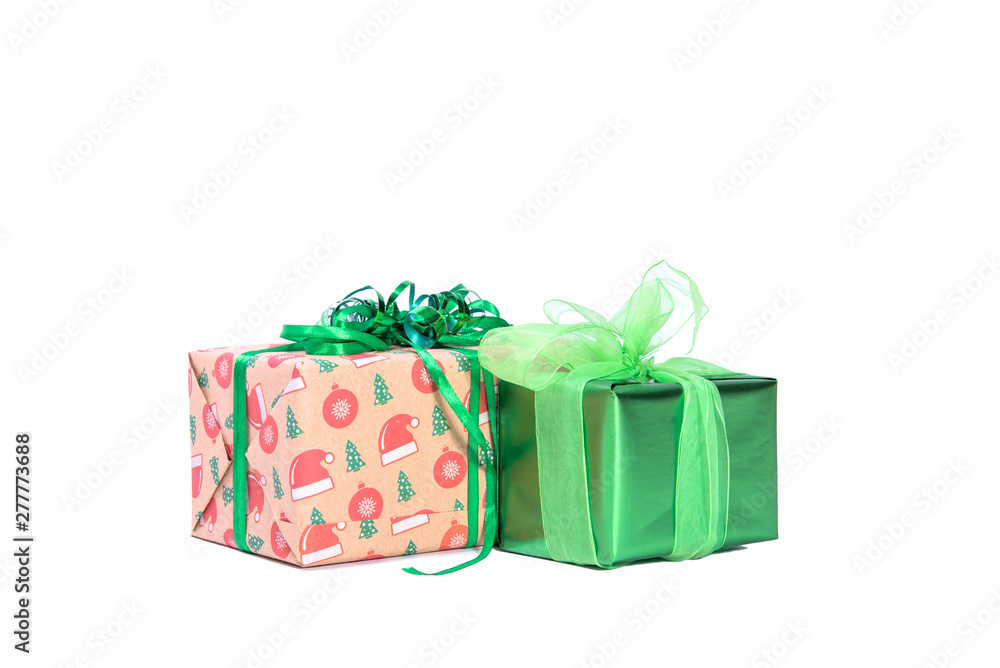 Obraz premium green and red gift box with a ribbon and a bow isolated.