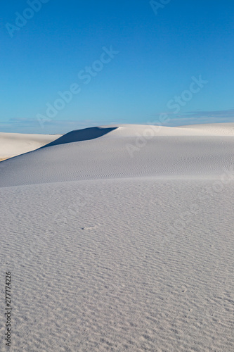 White Sands Desert in New Mexico beneath a blue sky