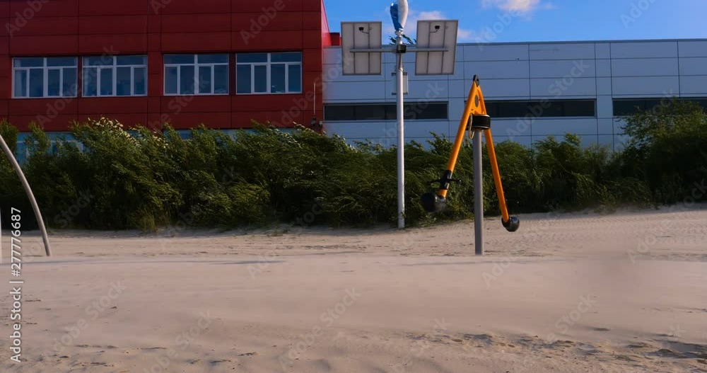 Playground on the sea in a storm. Children playground at the sea shore. Playground on the sea in a storm. Children playground at the sea shore.