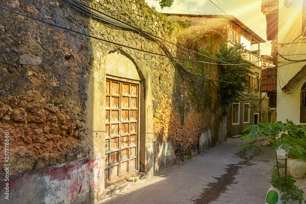 stone town streets and alley-ways with sunburst