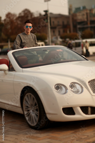 Car, bentley, luxury, Sexy, sexually, sunglasses, auto, rich, guy, model, man, male. supercar, super car, attractive, Comfort, Lux, vehicle, driver, automobile, success, successful, happy, dream photo