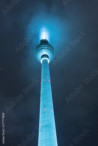 Germany, Berlin, illuminated television tower at night photo