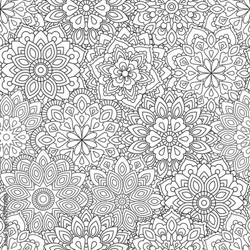 Seamless pattern of Mandala in ethnic oriental style. Decorative vintage flower for henna, yoga stuff, mehendi, tattoo, coloring book page. Zentangle inspired style.