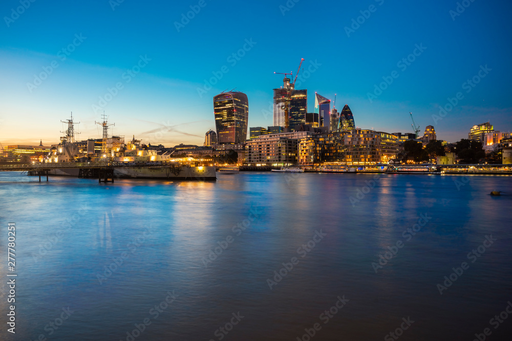 UK, London, Skyline at night with Hms Belfast in the foreground UK, London, Skyline at night with Hms Belfast in the foreground
