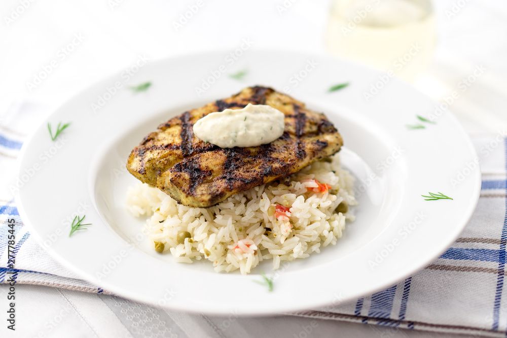 Mahi mahi fish fillet with grill marks. This lean tropical white fish is also known as common dolphinfish or dorado. Considered an healthy food rich in protein, it is perfect for bbq grilling. Mahi mahi fish fillet with grill marks. This lean tropical white fish is also known as common dolphinfish or dorado. Considered an healthy food rich in protein, it is perfect for bbq grilling.