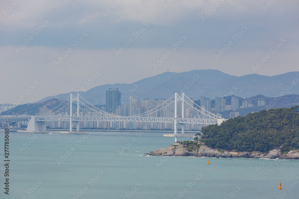 Many building with the Gwangan Bridge in the famous Haeundae District