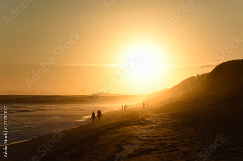 Elderly Couple Walking On Afternoon Sunset Beach  Mossel Bay  South Africa