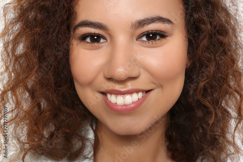 Portrait of young African-American woman with beautiful face, closeup