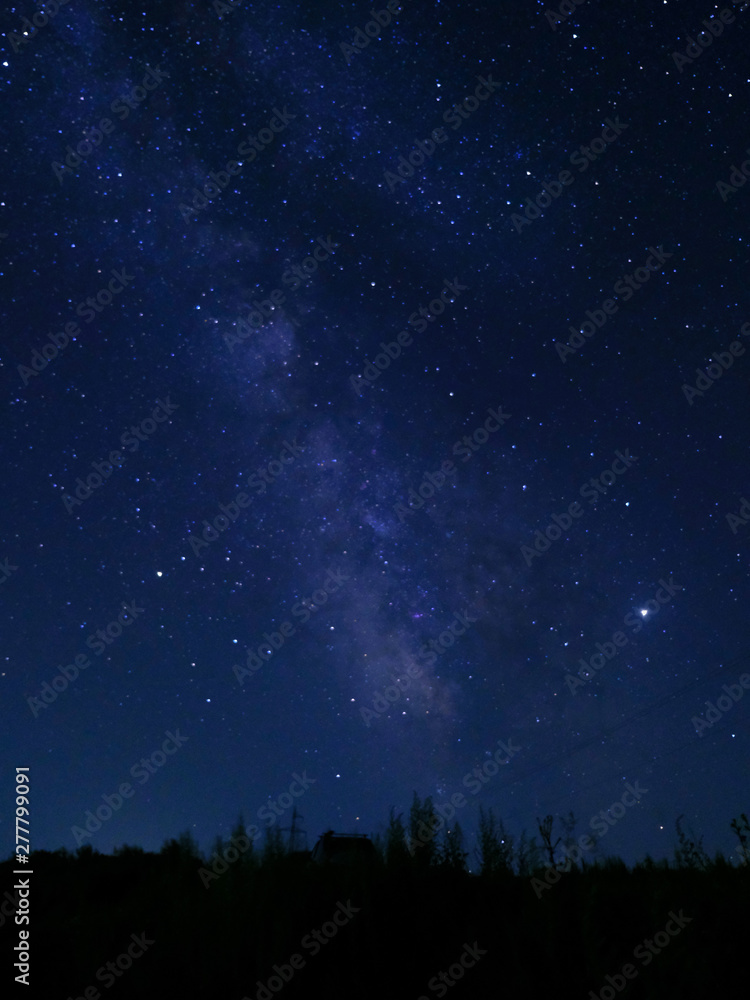 Naklejka premium blue sky with stars and milky way
